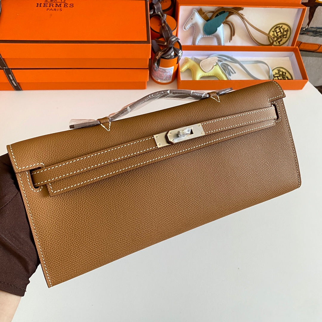 HERMES KELLY CUT 31 IN BRONZE BROWN CALFSKIN WITH SILVER HARDWARE