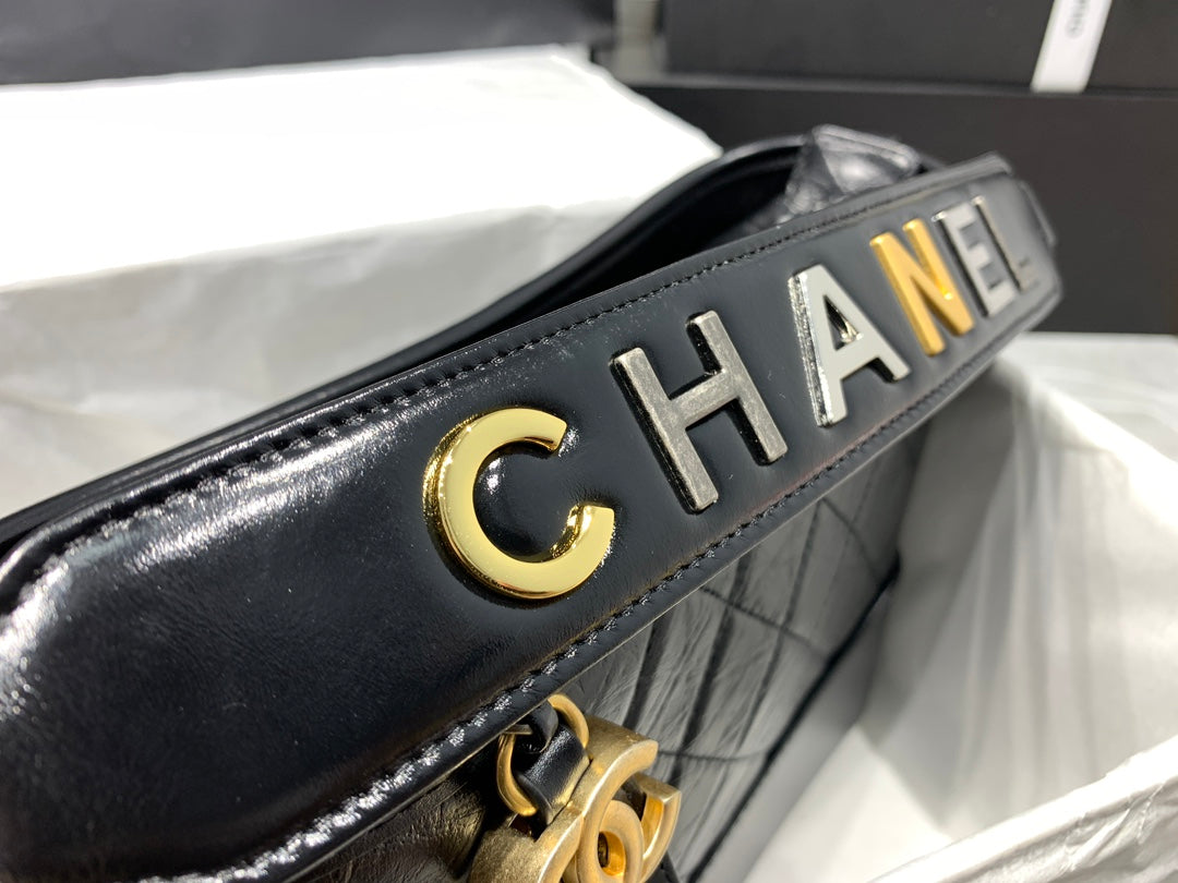CHANEL HOBO BAG 25 WITH STRAP IN BLACK CALFSKIN GOLD AND SILVER HARDWARE