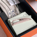 HERMES KELLY DESORDRE 20 IN WHITE EPSOM LEATHER WITH SILVER HARDWARE