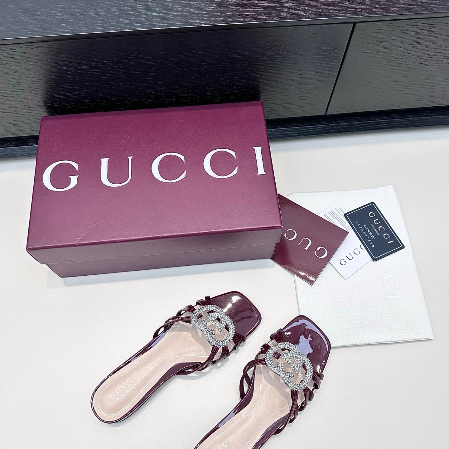 GUCCI 26S FLAT SLIDES IN DARK RED CALFSKIN WITH CRYSTAL