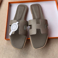 HERMES 0RAN SANDALS IN CEDAR BROWN CALFSKIN
