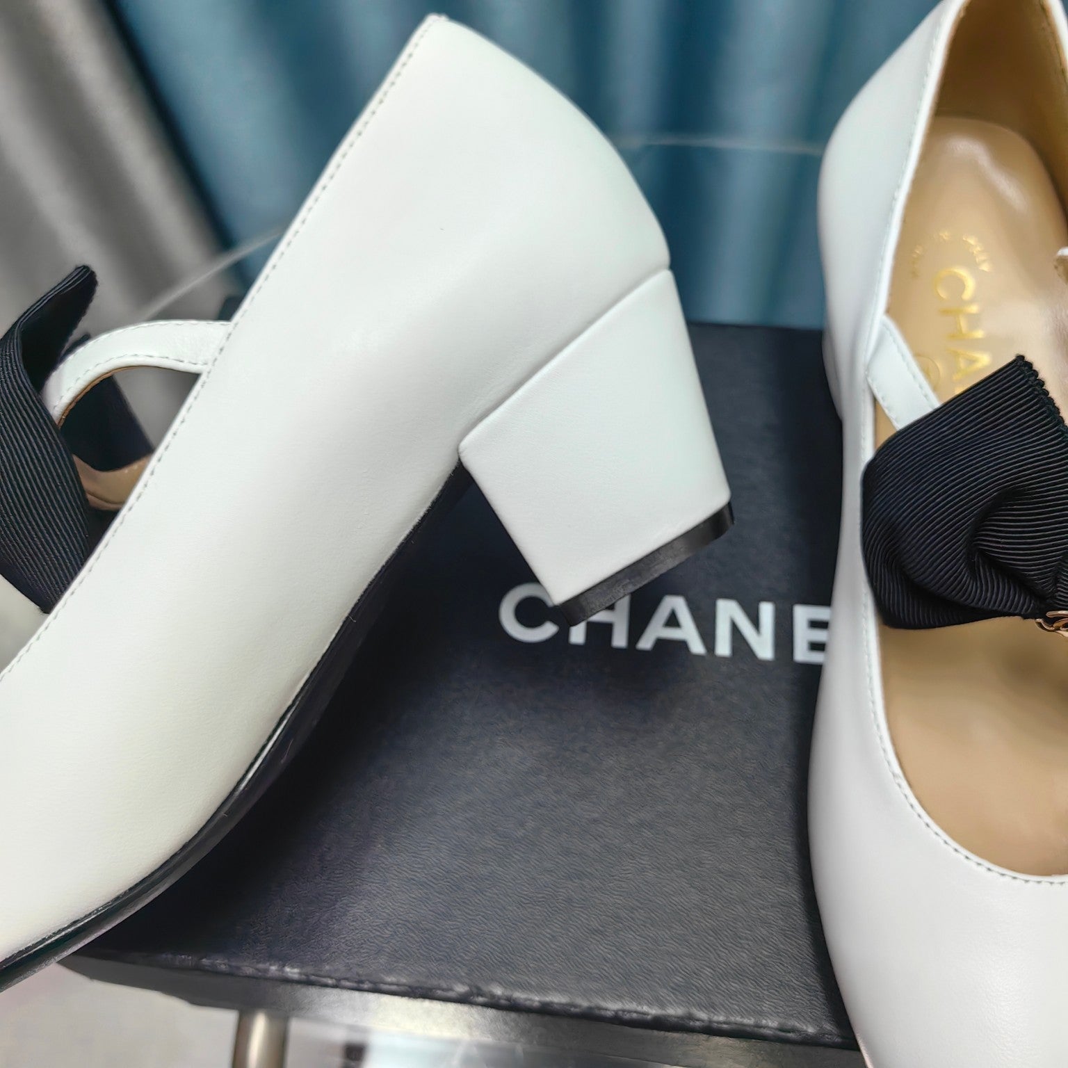 CHANEL HIGH MARY JANE SHOES WHITE SHEEPSKIN WITH BLACK BOW